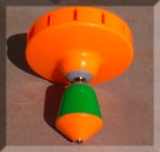 An Orange UFO Yo Yo.